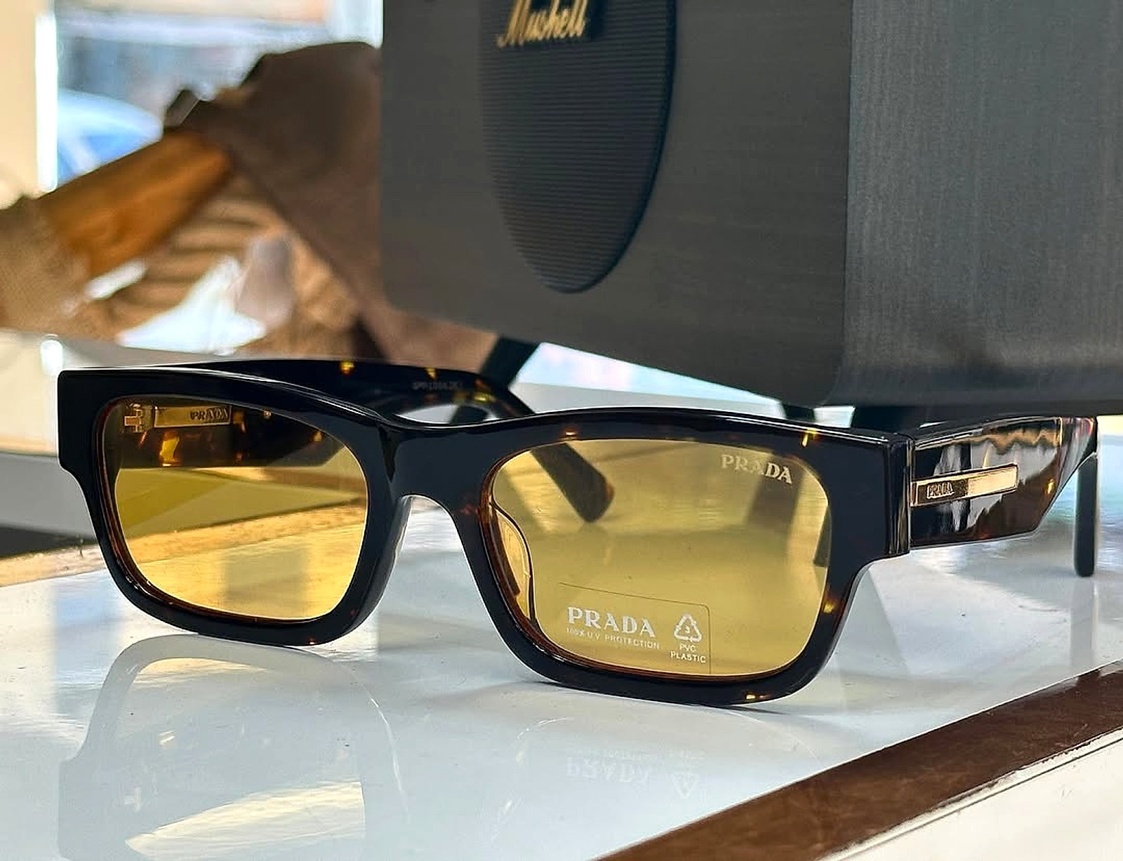 Let Prada Caption some yellow to your summer